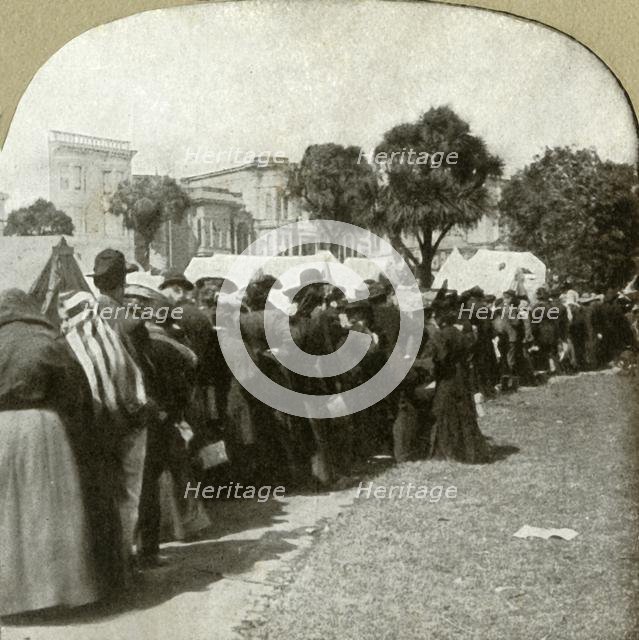 'Forming bread line at Jefferson Square', 1906.  Creator: Unknown.