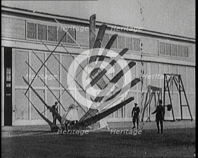 An Early Seven Winged Plane Collapsing in on Itself During Take Off, 1922. Creator: British Pathe Ltd.