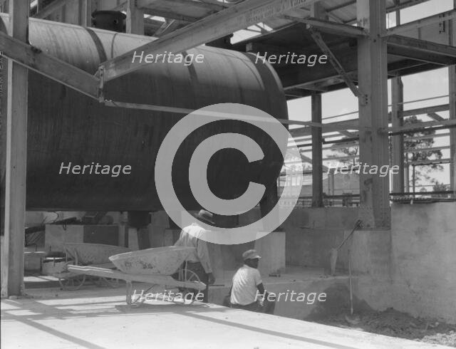 Turpentine still, Georgia, 1937. Creator: Dorothea Lange.