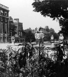 Garden and part of the east front, Hampton Court Palace, Richmond upon Thames, London. Creator: The Fine Art Photographers Co.