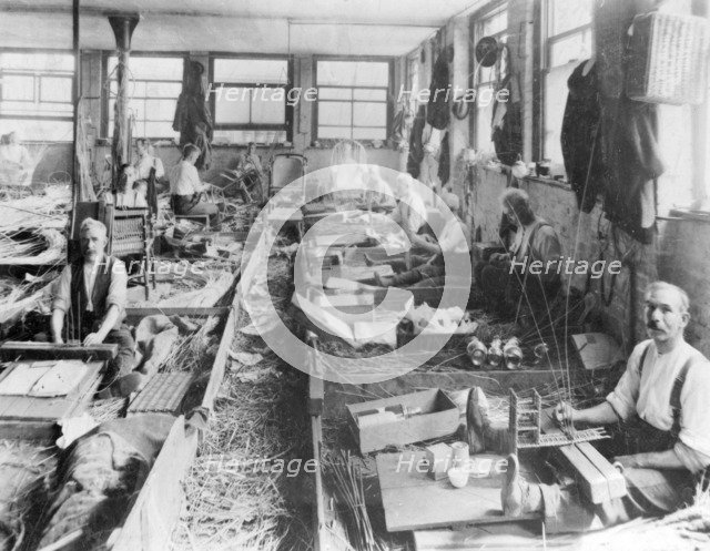 Men making wicker baskets for Scotts & Sons, London. Artist: Unknown
