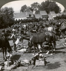 Troops feeding their horses and resting on the march, World War I, 1914-1918.Artist: Realistic Travels Publishers