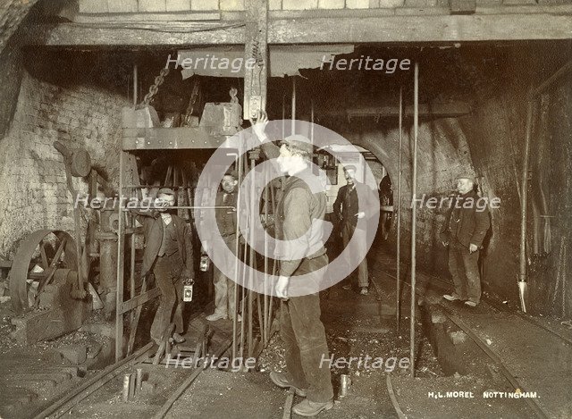 Ascending in the pit cage, Clifton Colliery, Nottinghamshire, c1895. Artist: HL Morel