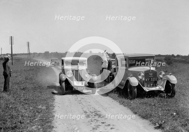 MG 18/80 of Mrs R Gough and Bianchi of Kitty Brunell at the B&HMC Brighton Motor Rally, 1930. Artist: Bill Brunell.
