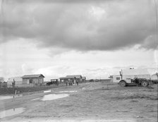 Street and homes in "Little Oklahoma", California, 1936. Creator: Dorothea Lange.