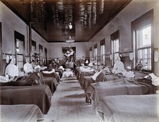 Johannesburg Hospital, South Africa: hospital ward with male patients, many with bandaged...c1905. Creator: Unknown.