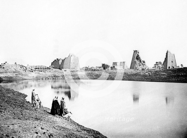 Sacred Lake and temple ruins, Karnak, Nubia, Egypt, 1887. Artist: Henri Bechard