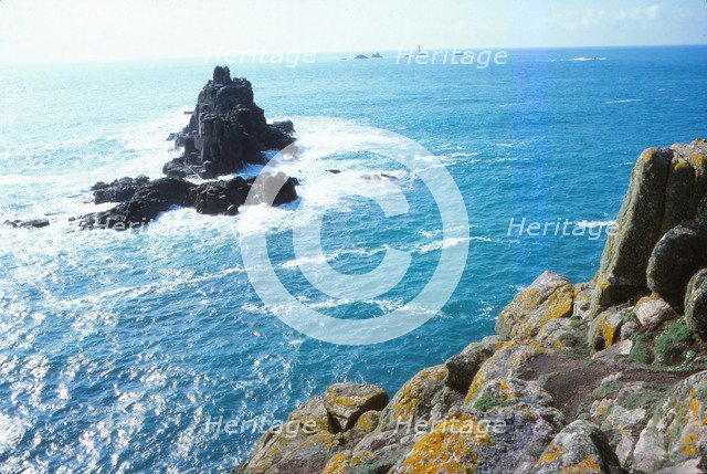 Longships Lighthouse and the Armed Knight, Lands End, Cornwall, 20th century.  Artist: CM Dixon.