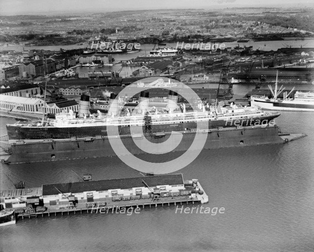 The original RMS 'Mauretania' in the floating dry dock, Southampton, Hampshire, 1933. Artist: Aerofilms.