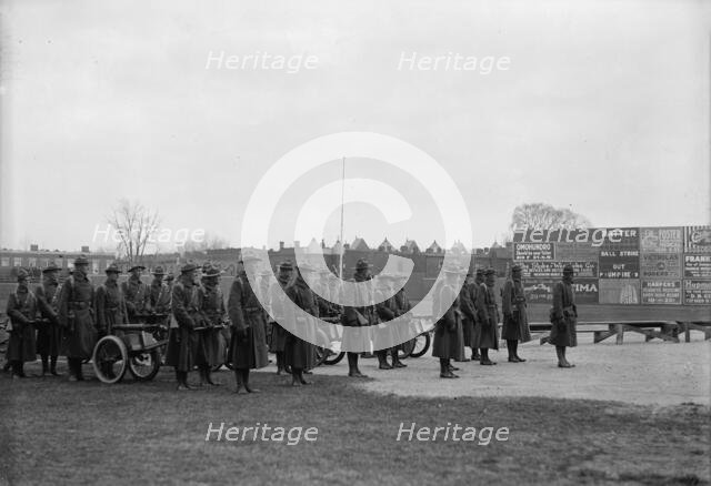 Marine Corps, U.S.N. Machine Gun Unit Demonstration at Ball Park, 1917. Creator: Harris & Ewing.