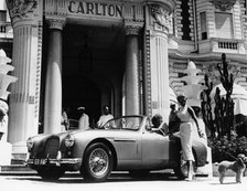 Aston Martin DB2-4 outside the Hotel Carlton, Cannes, France, 1955. Artist: Unknown