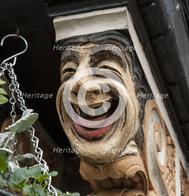 Painted corbel bracket on the Station public house, The Broadway, Stoneleigh, Ewell, Surrey, 2014. Artist: Derek Kendall.