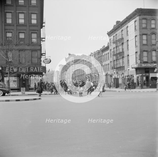 Many accidents are attributed to unpatrolled intersections in Harlem, New York, 1943. Creator: Gordon Parks.