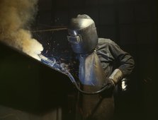 Welder making boilers for a ship, Combustion Engineering Co., Chattanooga, Tenn., 1942. Creator: Alfred T Palmer.