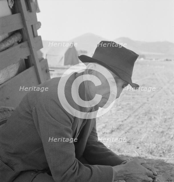 Former Nebraska farmer, now a migrant farm worker, Klamath County, Oregon, 1939. Creator: Dorothea Lange.