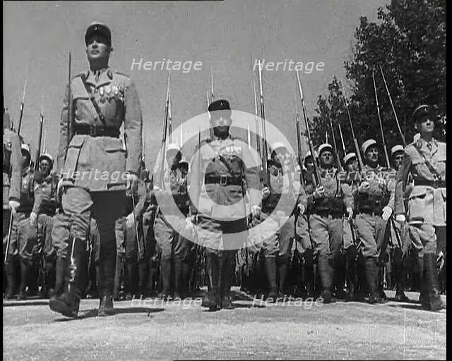 Lines of Male French Foreign Legion Soldiers Marching Towards the Camera During the Bastille...,1939 Creator: British Pathe Ltd.