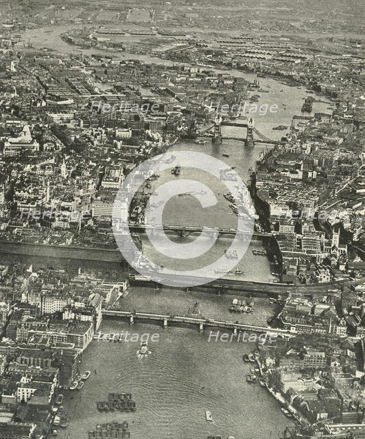 "The Great Street Paved With Water" The Thames from Southwark to Blackwall', 1937. Creator: Aerofilms.