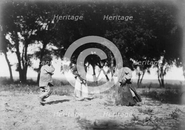 Child life, the cotton woods-Navaho, c1905. Creator: Edward Sheriff Curtis.