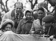 The Royal family watch a portable television at the Badminton Horse Trials, 1973. Artist: Unknown
