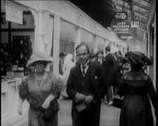 William Aitken, 1st Baron Beaverbrook, and His Wife, Gladys, Walking Together at the...London, 1922. Creator: British Pathe Ltd.