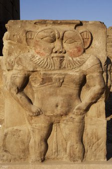 Relief of the god Bes, capital of column, Temple of Hathor, Dendera, Egypt, 2003. Creator: LTL.