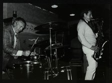 Derek Hogg (drums) and Bobby Wellins (saxophone) playing at The Bell, Codicote, Hertfordshire, 1985. Artist: Denis Williams