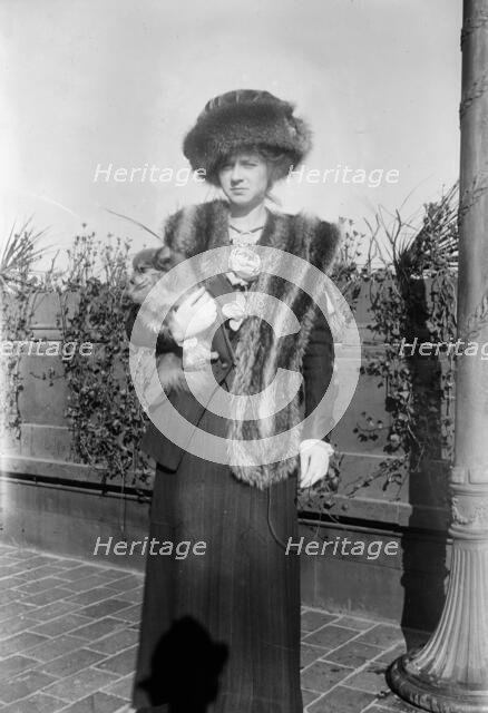 Miss M. Kennedy & "Pomeranian [i.e., Pomeria] Buttercup", 1911. Creator: Bain News Service.