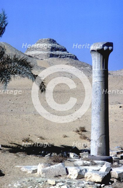 Step Pyramid of King Djoser (Zozer) behind ruins of temple, Saqqara, Egypt, c2600 BC. Artist: Imhotep