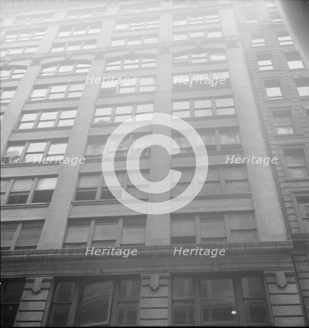 Background photgraph for Hightstown project, Garment factory on West Twenty-first Street, NY,1936. Creator: Dorothea Lange.