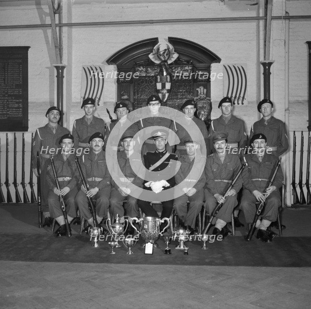 Soldiers and their officer in front of the Honourable Artillery Company's War Memorial, c1945-c1965. Artist: SW Rawlings