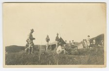 Photographic postcard of Charles Wilbur Rogan with his unit in the Philippines, 1910-1919. Creator: Unknown.