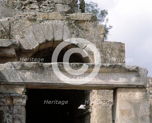 Roman Theatre of Mérida, founding date on the entrance arch of one of the 'Parodos' in times of M…