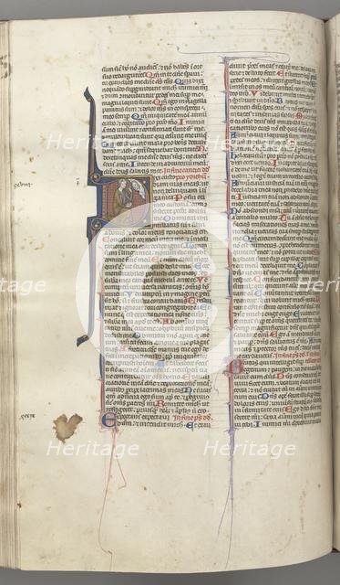 Fol. 220v, Psalm 38, historiated initial D, David kneeling, gesturing to the bust of God above, c. 1 Creator: Unknown.