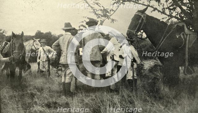 'General Lawton Learning from Cuban Officers...June 30th', Spanish-American War, 1898, (1899). Creator: Burr McIntosh.