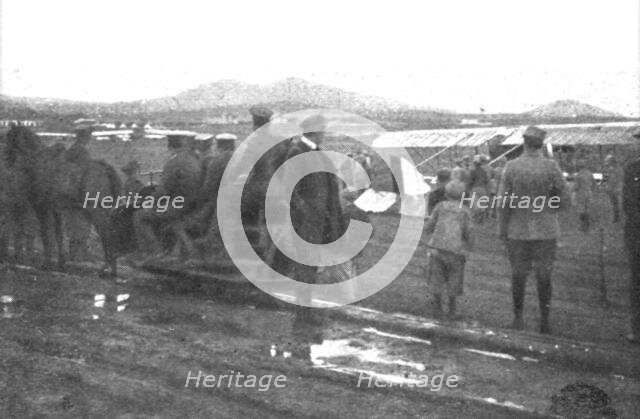 'Les premiers contingents Franco-Anglais a Salonique; Au camp d'aviation francais de...1915 (1924). Creator: Unknown.