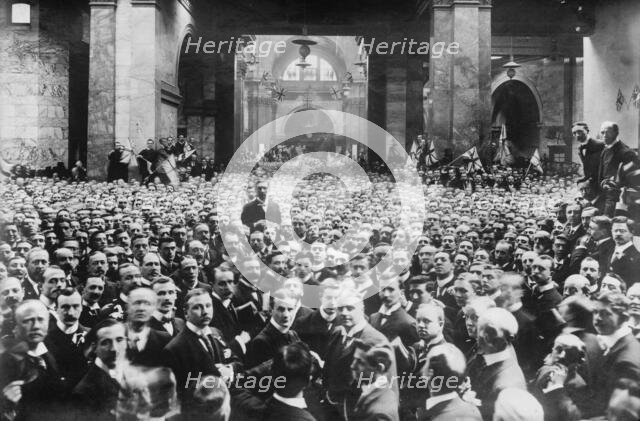 Crowd on stock exchange floor, London, between 1910-1920. Creator: Bain News Service.