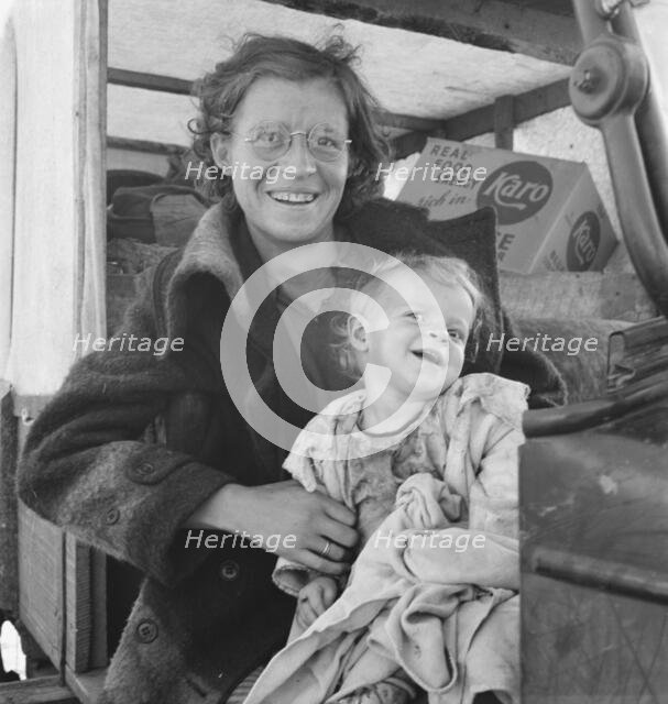 Mother and baby of family on the road, Tulelake, Siskiyou County, California, 1939. Creator: Dorothea Lange.