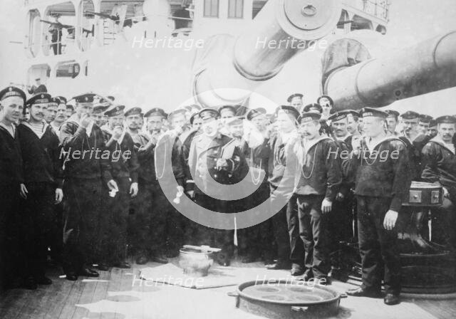Serving grog on Russian Battleship, between c1910 and c1915. Creator: Bain News Service.