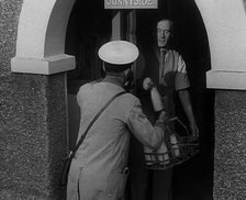 A Man Delivering Milk, 1940. Creator: British Pathe Ltd.