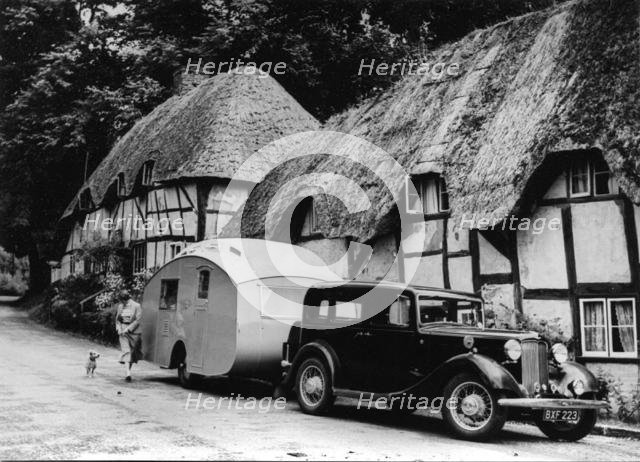 1936 Austin Twenty with caravan. Creator: Unknown.