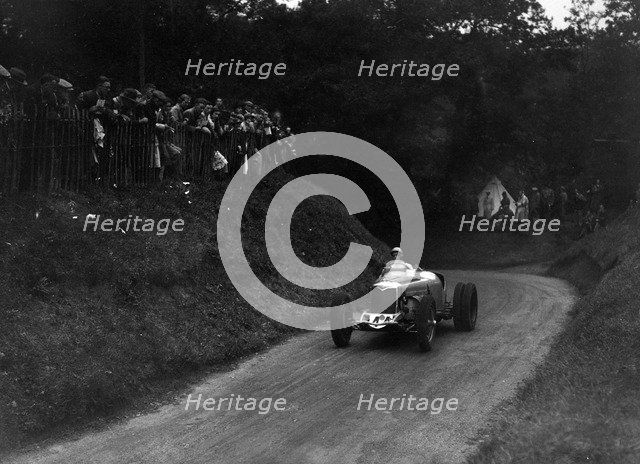 Riley competing in the Shelsley Walsh Hillclimb, Worcestershire, 1935. Artist: Bill Brunell.