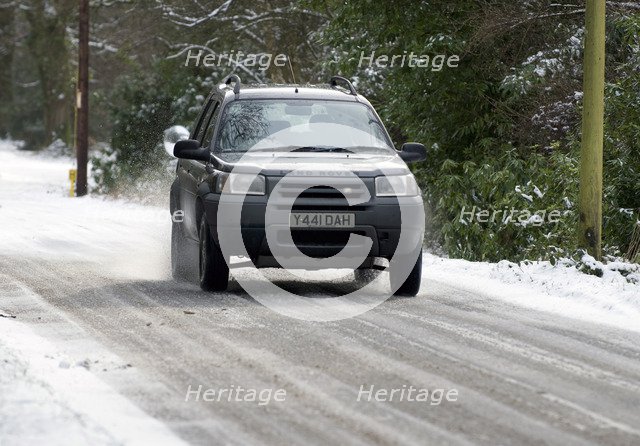 2001 Land Rover Freelander driving on icy road Artist: Unknown.