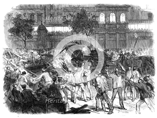 The Disturbances in Paris:...mob attempting to construct a barricade...Boulevard Montmartre..., 1869 Creator: Unknown.