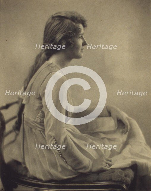 Young woman seated, looking right, 1918. Creator: Unknown.