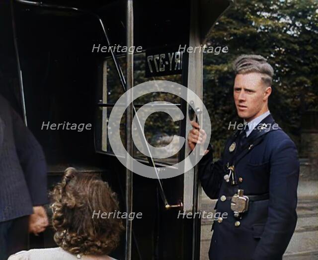 Bus conductor, 1940. Creator: British Pathe Ltd.