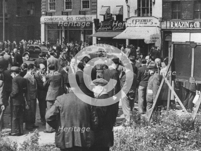 Jewish tailors looking for employment, Whitechapel Road, London, c1940s. Artist: Unknown