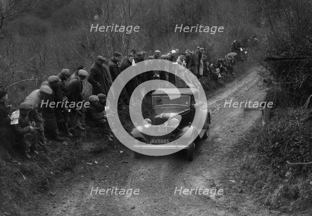 Ford V8 of DJC Palmer competing in the MCC Lands End Trial, 1935. Artist: Bill Brunell.