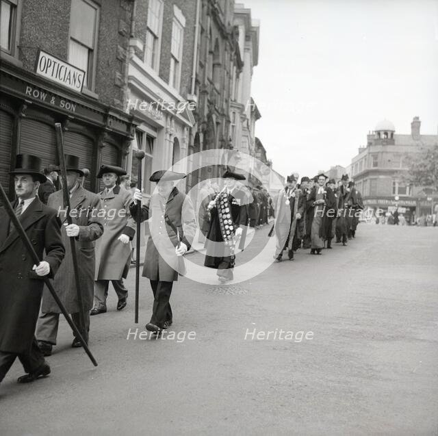 Horn blowers in procession, Ripon, Yorkshire, c1955.  Creator: Arthur Charles Kirby Ware.