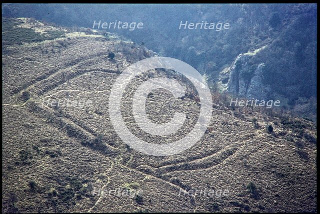 Iron Age univallate hillfort earthwork at Burrington Camp, Somerset, 1971. Creator: Jim Hancock.