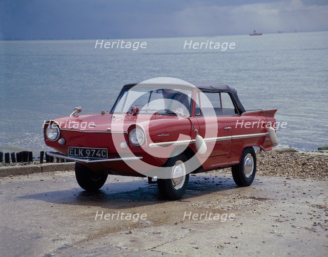 A 1965 Amphicar at the water's edge. Artist: Unknown